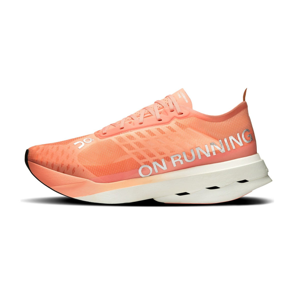 On Running Cloudboom Strike Sunstone White