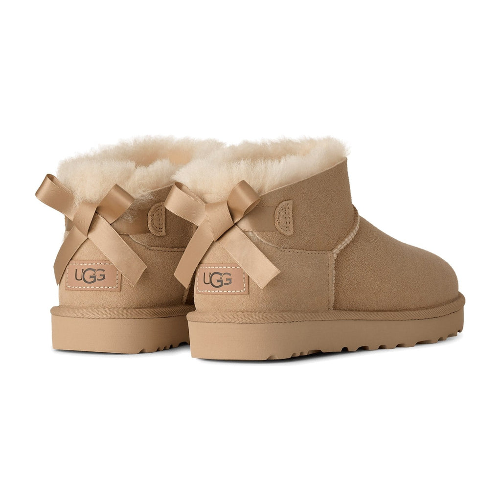 UGG Ultra Mini Bailey Bow Boot Sand (W)