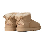 UGG Ultra Mini Bailey Bow Boot Sand (W)